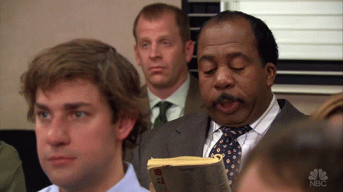 a GIF os Stanley from "The Office" asking, "Did I stutter?"