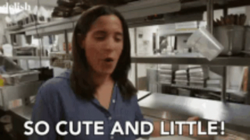 a woman in a kitchen says so cute and little !