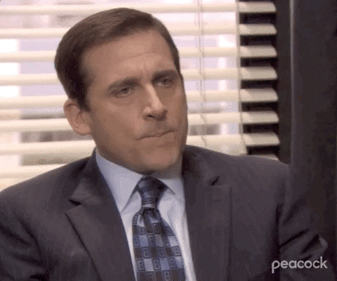 The Office gif. Steve Carell as Michael Scott purses his lips and raises his eyebrows in annoyance as he says, "What?" 