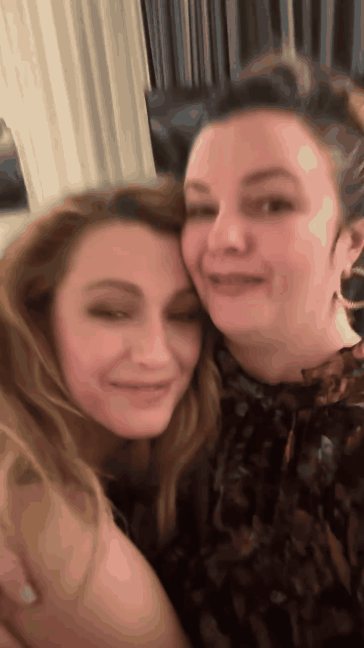 A GIF of Amber and Blake. They are shown from the neck up and are embracing while looking into the camera as it moves closer to their faces. 