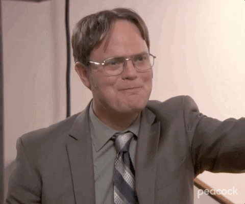 The Office gif. Rainn Wilson as Dwight gives us an unusually earnest smile along with a "Thank you."