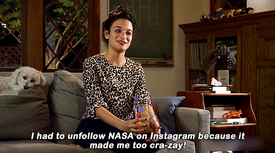Jenny Slate sitting on a couch on an episode of Drunk History, leaning forward and saying "I had to unfollow NASA on Instagram because it made me too cra-zay!"