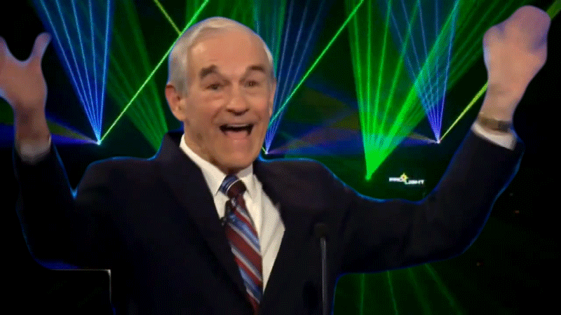 Ron Paul "It's Happening" gif (he's waving his arms around with lasers in the back while "it's happening" flashes onscreen in meme text)
