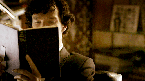 655989980sherlock-holmes-reading-book-animated-gif - The Writing Gym