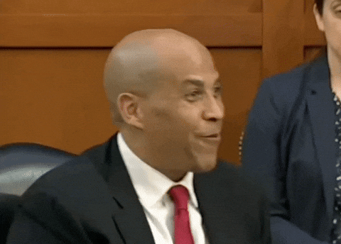Cory Booker Watch Me Shoulder Brush GIF | GIFDB.com