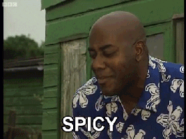 Animated gif of a man licking his lips and saying, "Spicy!"