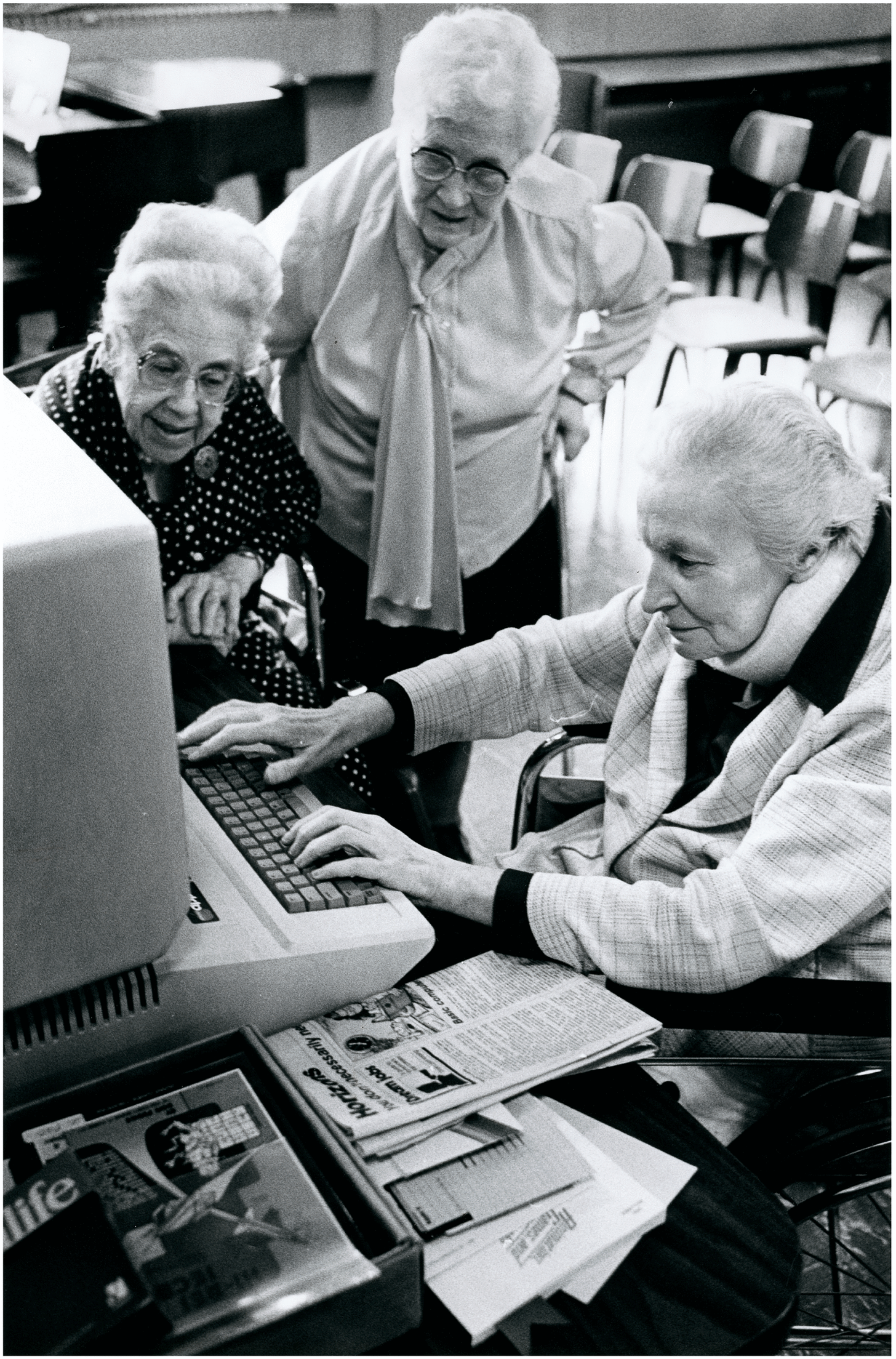 Graphic: Sister Kenneth (right) in April, 1984, demonstrating computing to BVM sisters Gladys Ramaley and Marian Delany. Photo Credit: Reprinted with permission of the Dubuque Telegraph Herald.