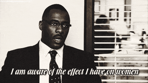 Gif of Idris Elba, a handsome African American man, in a dark suit, saying 'I am aware of the effect I have on women'