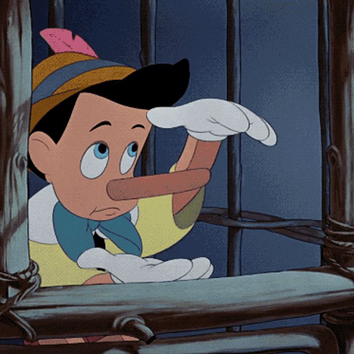 Walt Disney's Pinocchio's nose grows and leaves sprout from it as he lies - animated gif