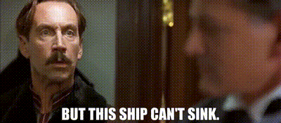 GIF of Jonathan Hyde who plays Bruce Ismay in Titanic saying, “But this ship can’t sink.”