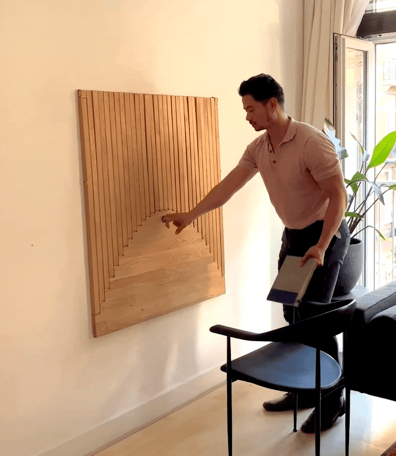 An animated gif of the designer unfolding the desk