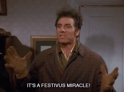 GIF of Kramer from Seinfeld exclaiming, "It's a Festivus miracle!"