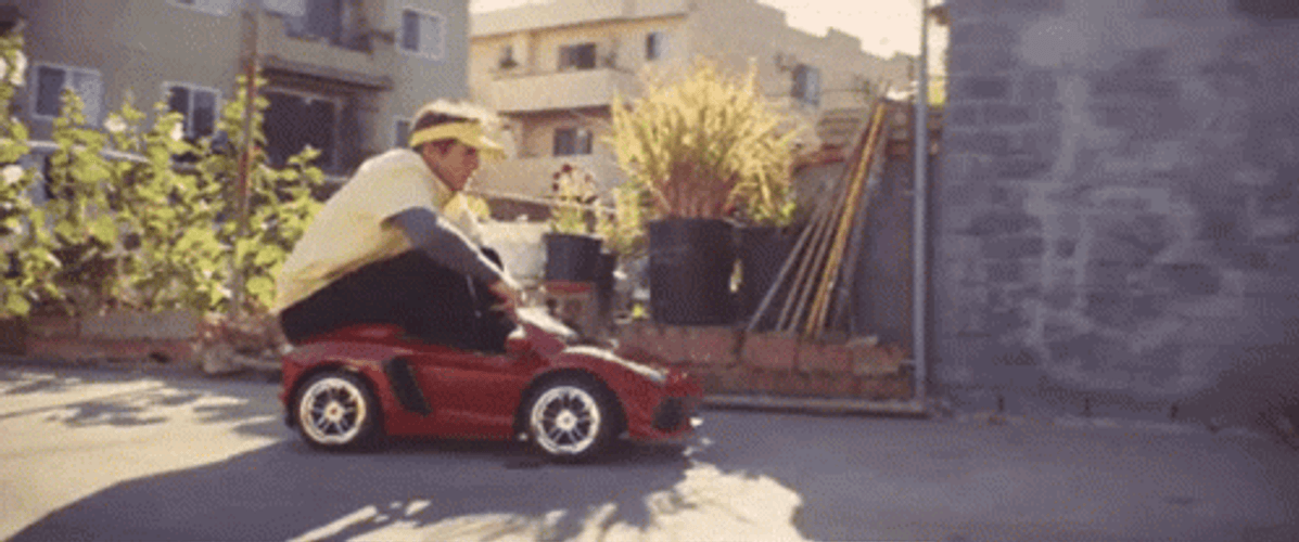 Grown Guy Riding Toy Car GIF | GIFDB.com