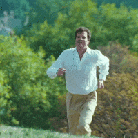 GIF of Colin Firth running in slow motion
