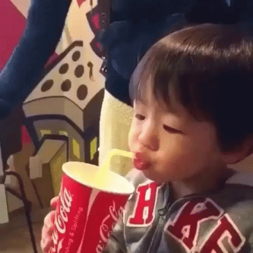 Kid Drinks GIF - Kid Drinks Coca Cola - Discover & Share GIFs