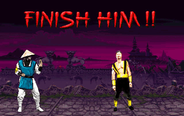 A screenshot of the video game Mortal Kombat. Two men stand on the screen. One combatant looks dazed and the other is ready to strike. Large blood red letters say 'FINISH HIM!'