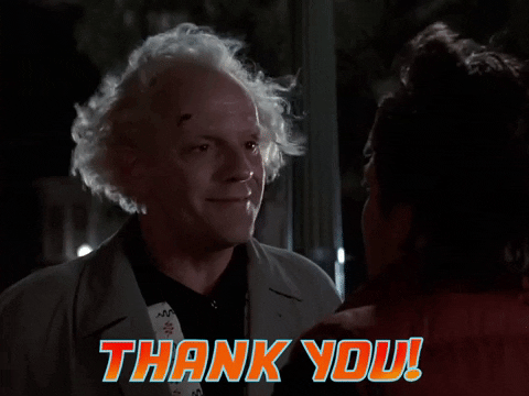 Movie gif. Christopher Lloyd as Doc Brown and Michael J. Fox as Marty McFly in Back to the Future stand in the wind. Doc Brown looks at Marty with a warm expression and says, “Thank you!”