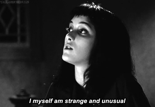A gif of Winona Rider in Beetlejuice, saying "I myself am strange and unsual"