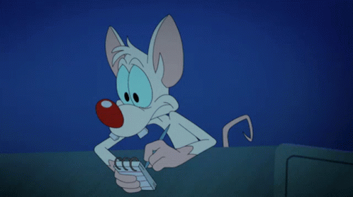 Gif dal cartone animato Animaniacs: sfondo blu omogeneo e il topo Mignolo appoggiato con gli avambracci mentre, assonnato, prende appunti su un taccuino.