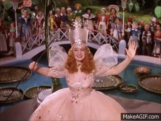 gif of Glenda the good witch and her admirers