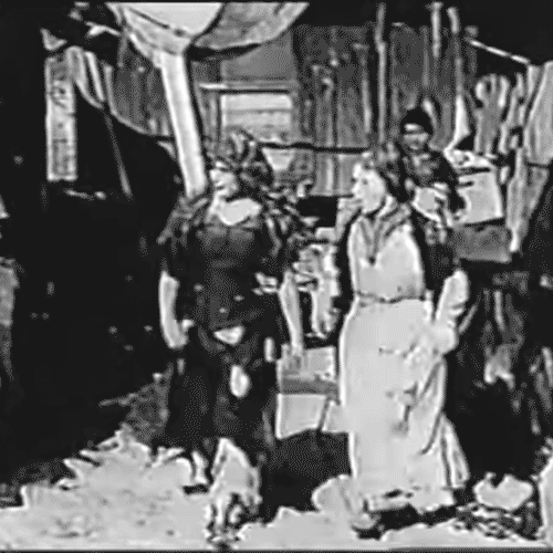 Anomated gif from 1914 film Tess of the Storm Country - Tess, played by Mary Pickford, receives a letter in the village