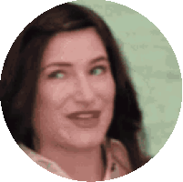 a close up of a woman 's face in a circle on a white background .