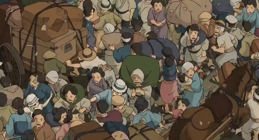 Animated gif of a densely packed crowd of people with carts and pack animals pushing past each other. 