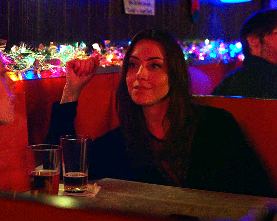 Aubrey Plaza as Riley in the Christmas bar.