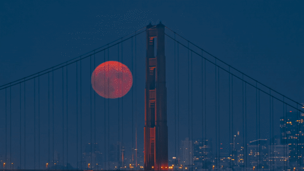 Super Blue Moon Rises Behind Golden Gate Bridge in Hazy San Francisco Sky