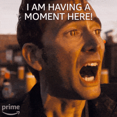 a man with his mouth open and the words " i am having a moment here "