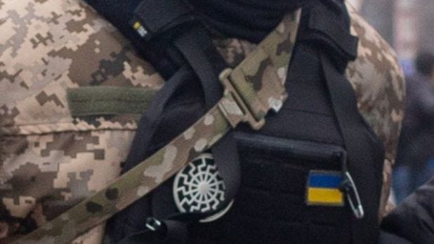 Black sun: what is the symbol associated with Nazism used by the Ukrainian  military in a viral photo of the war
