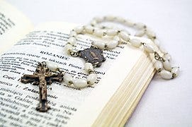 File:Rosary on Polish Bible.jpg