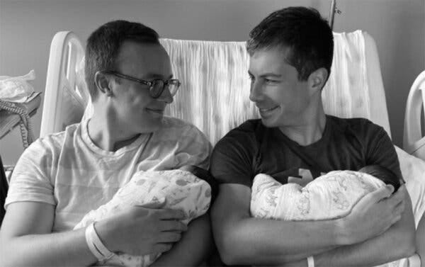 Pete Buttigieg, right, and his husband, Chasten, announced on Saturday that they had become parents of a boy and a girl.