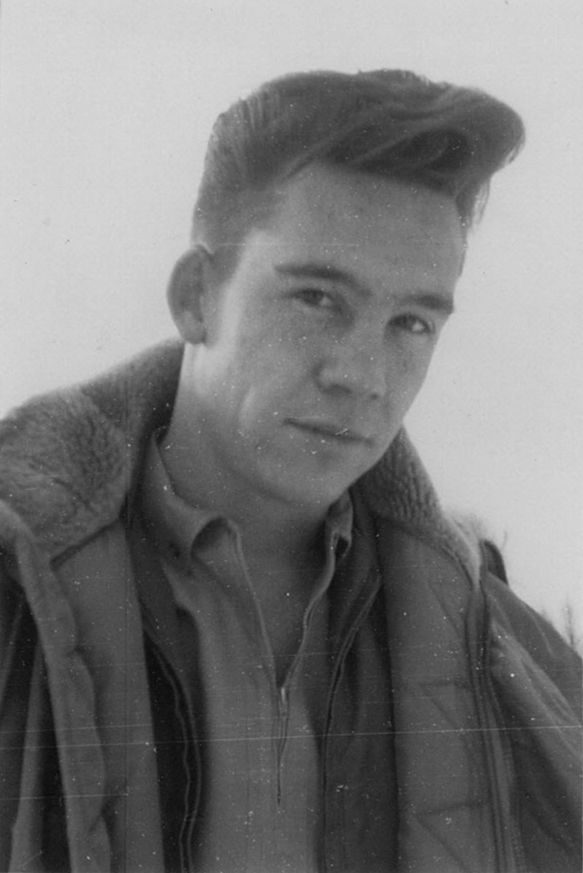 Old black and white photo of a young Bob Ross without a perm