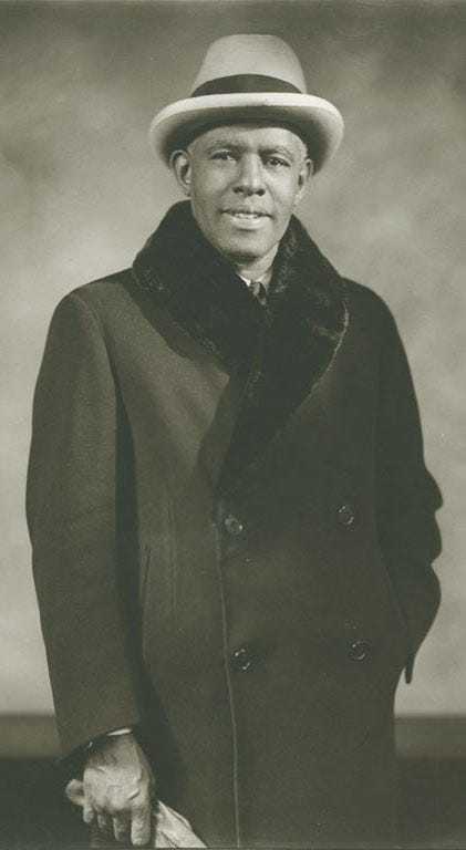 Photographic portrait of tenor Roland Hayes in a hat and fur trimmed coat