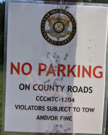 a picture of a no parking sign