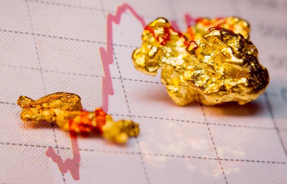 Gold nuggets and stock market graph