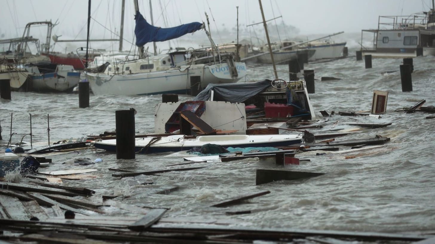 Loose and damaged boats are tossed around after the docks at the Corpus Christi marina where they had been secured were destroyed as Hurricane Hanna made landfall Saturday.