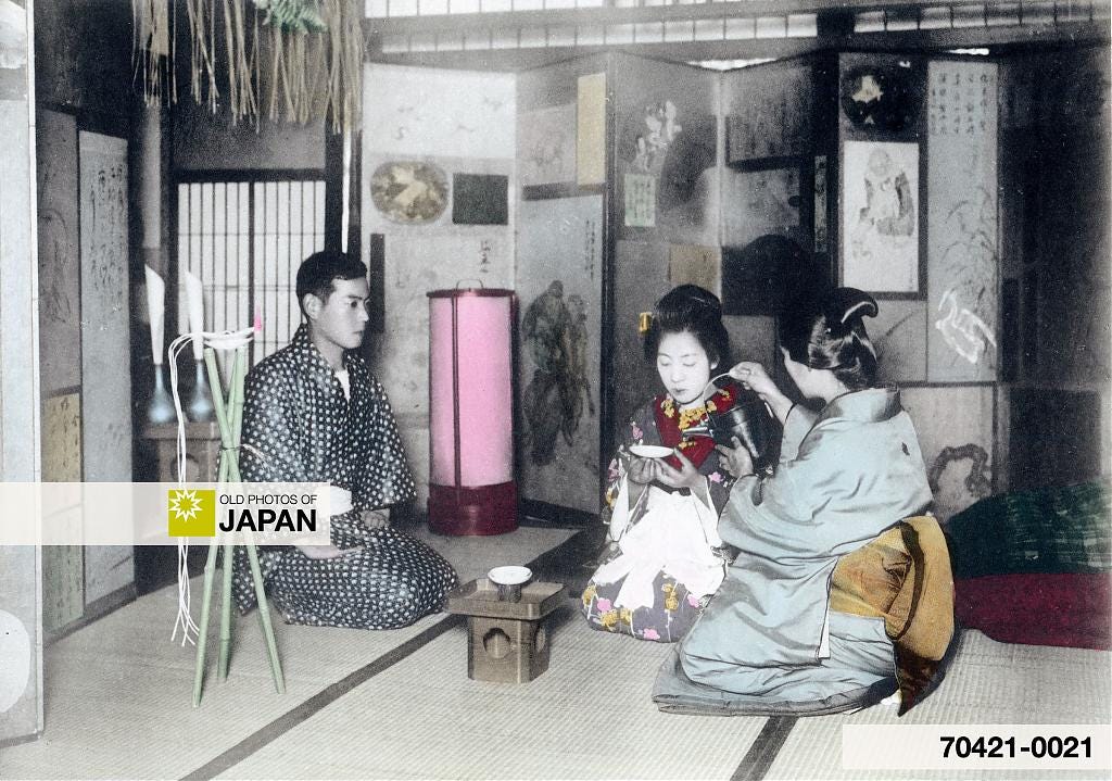 A mother serves sake to her son and his new wife after a wedding, 1905