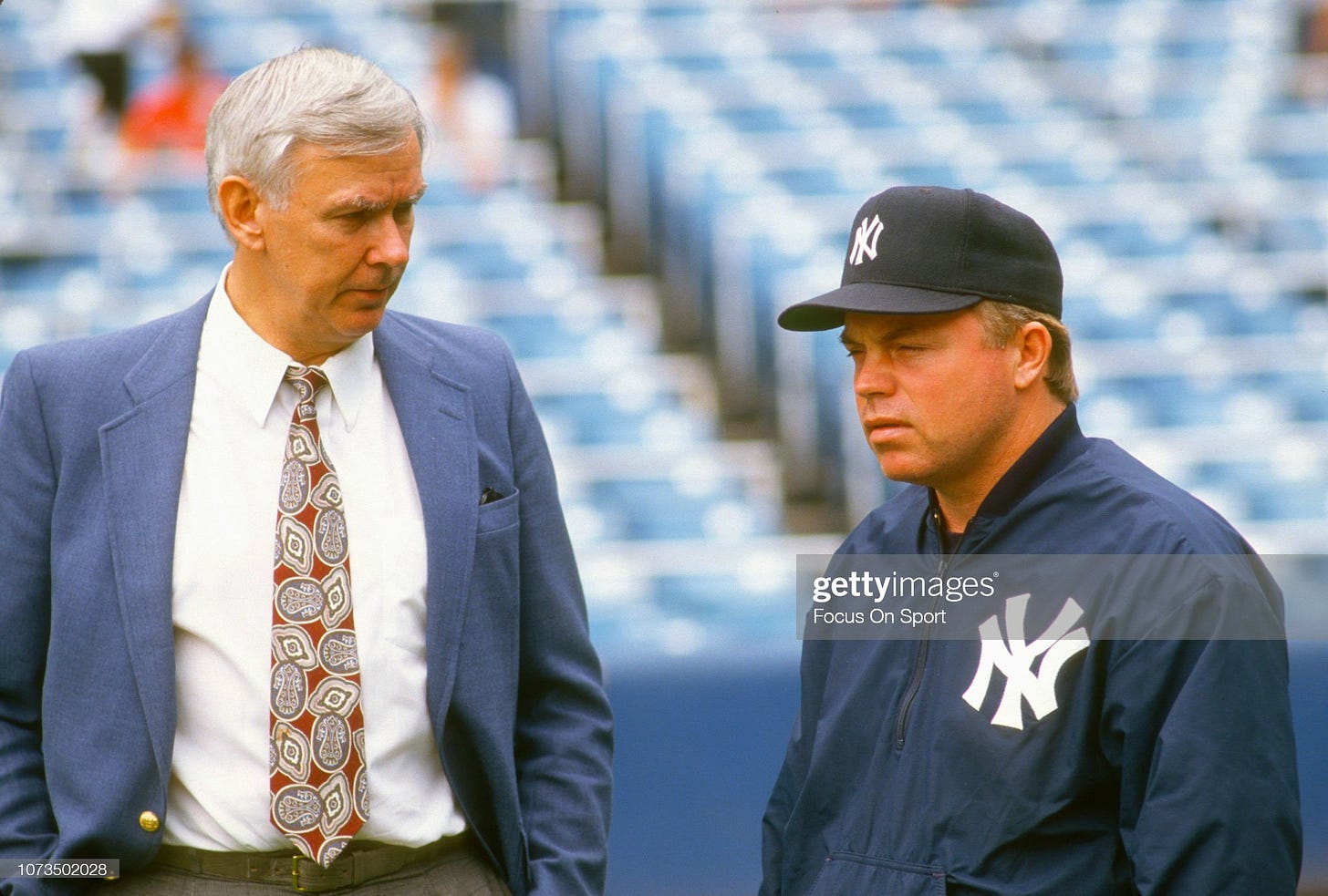 General Manager Gene Michael of the New York Yankees talks with his... News  Photo - Getty Images