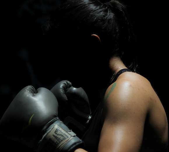 A boxer in the shadows.