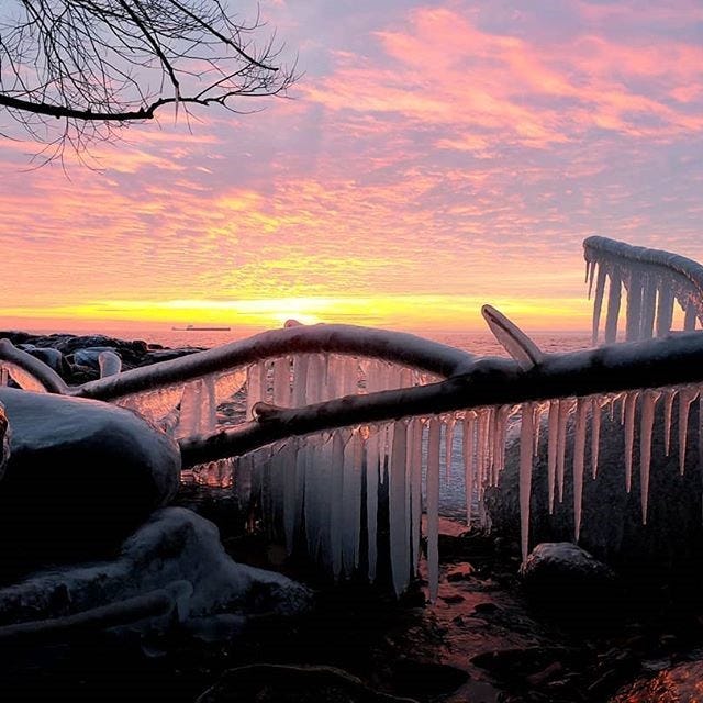 Beautiful morning sunrise thru the frozen spray from Lake Superior