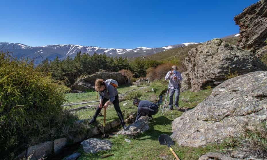 Cleaning irrigation channels at Jérez del Marquesado, Sierra Nevada, Spain