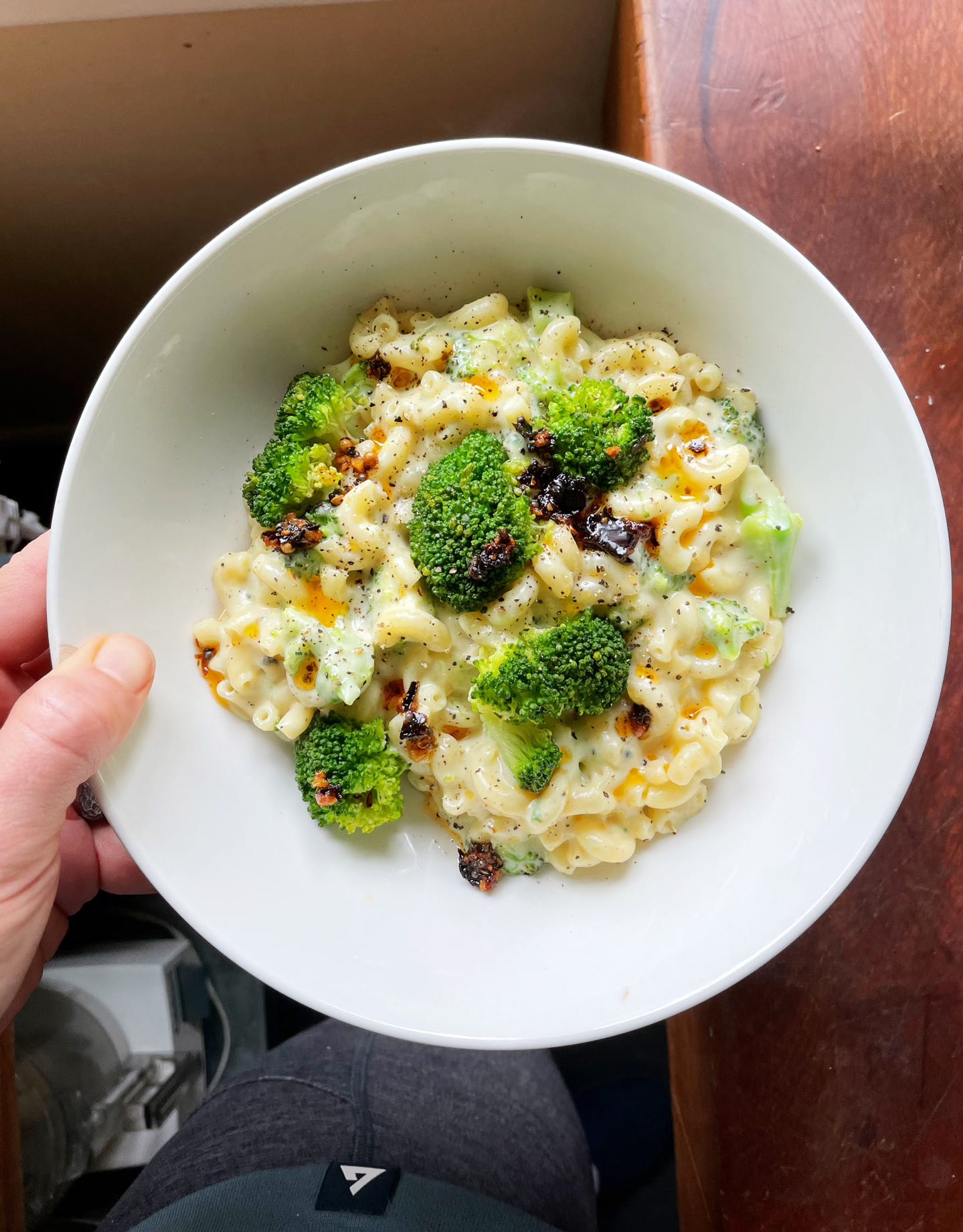 Bowl of mac and cheese with broccoli