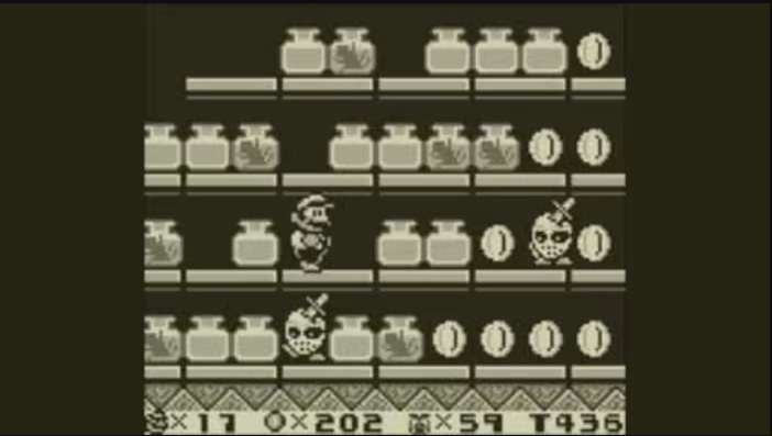 A screenshot from Super Mario Land 2, featuring a Mario who fits in nicely next to his Super Mario World look, with detailed enemies and backgrounds, as well as objects that all seem to be the size you'd expect them to be, like the coins to be collected.