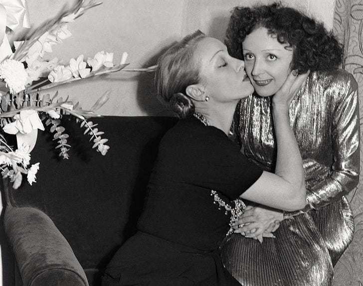 Marlene Dietrich was bisexual. There are claims that she and Edith Piaf  were together for some time. - Imgur