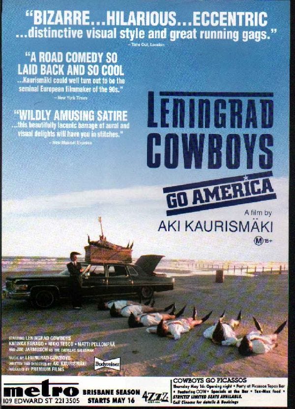Poster for Leningrad Cowboys Go America, depicting the band laying on a beach in Mexico. 