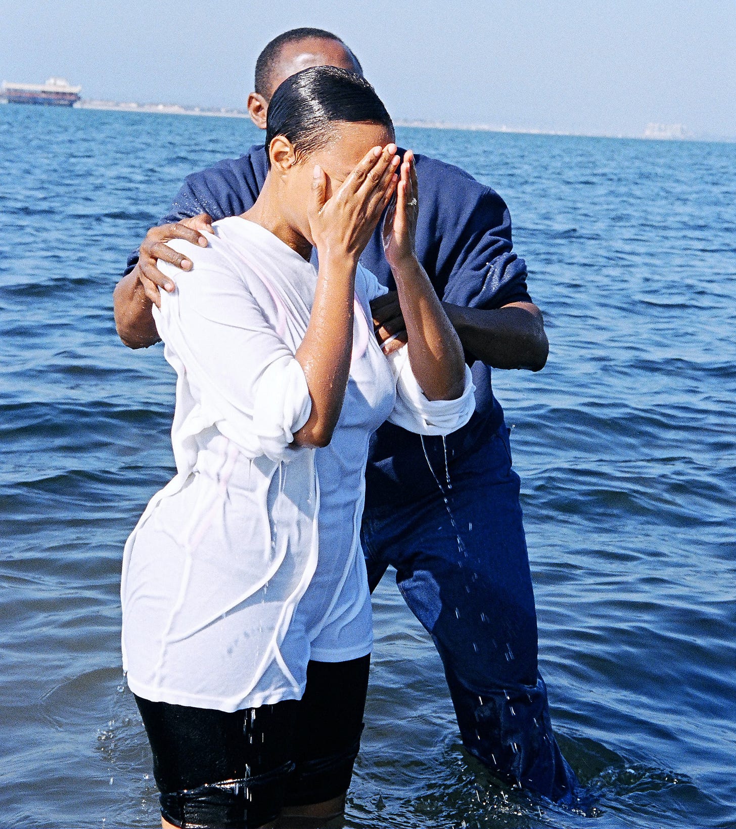 Baptism at a river