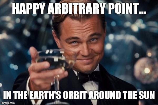 Leonardo DiCaprio in a tux toasts with a coupe of champagne. Text reads "Happy Arbitrary Point in the Earth's Orbit Around the Sun."