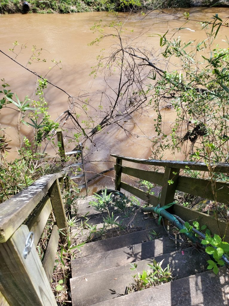 Stairways up from flooded river